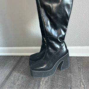 Thigh high faux leather boots